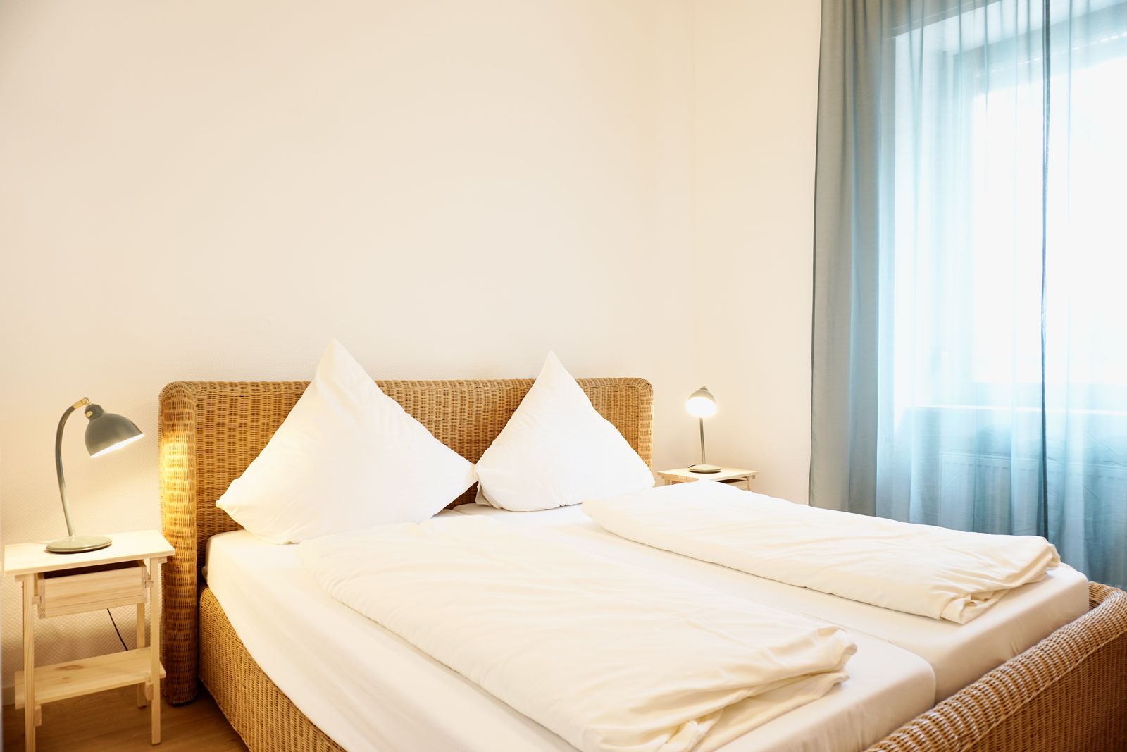 Schlafzimmer mit Doppelbett der Ferienwohnung Bär 38